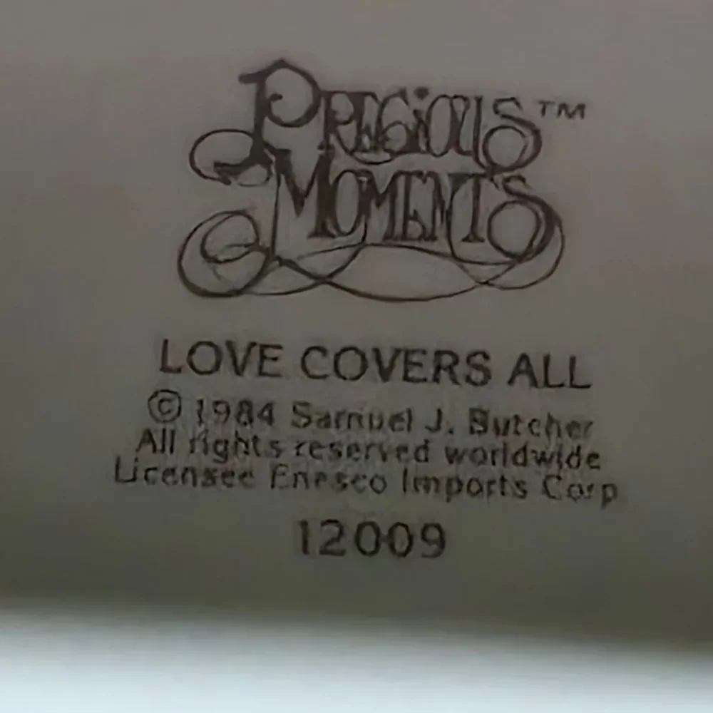 Precious Moments Love Covers All Figurine